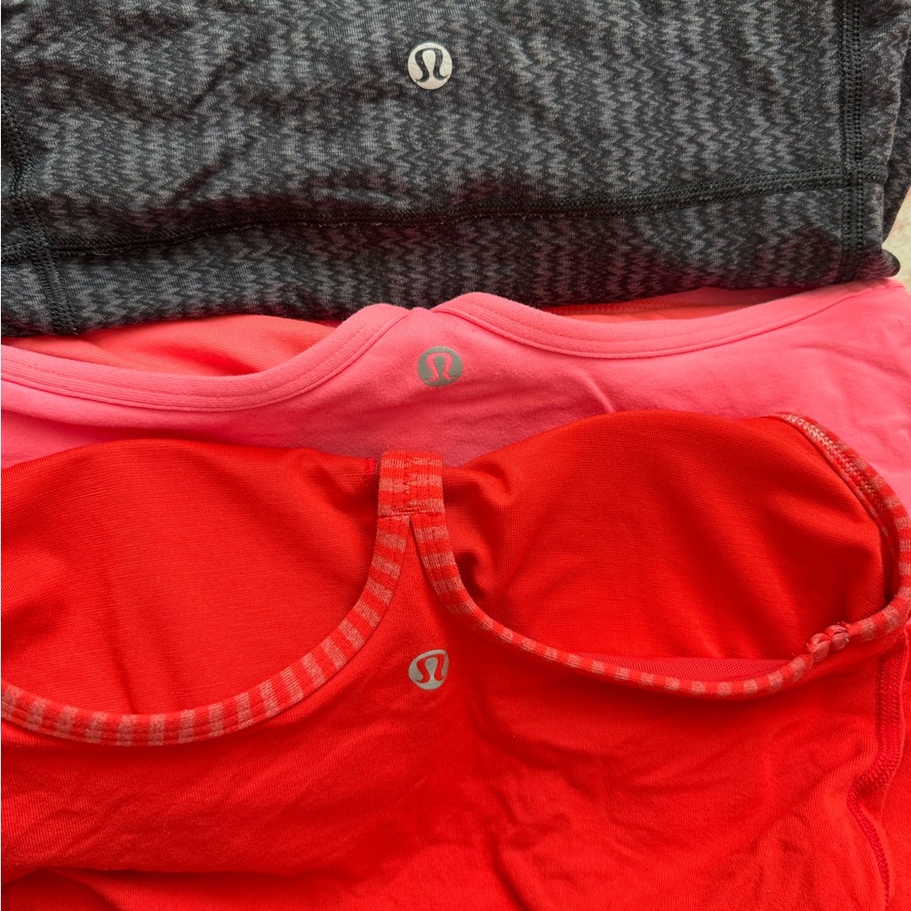 Lululemon, 3 Tank Tops in Black, Pink, and Red